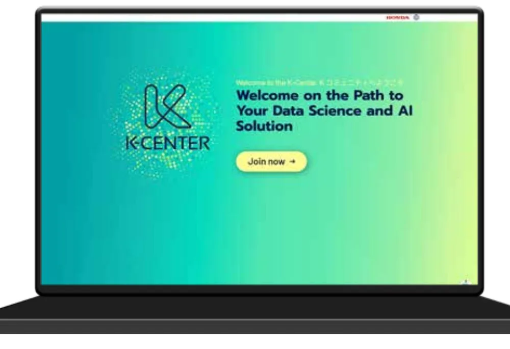 Website des K-Centers auf einem Laptop in Türkis und Grün